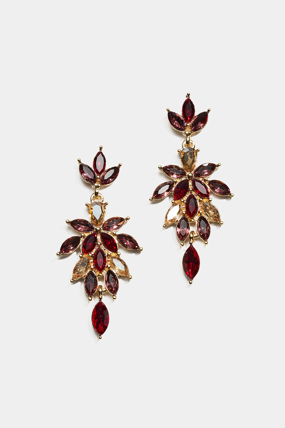 Korvakorut, joissa on vaaleanpunaisia ja punaisia lehdennmuotoisia lasikiviä