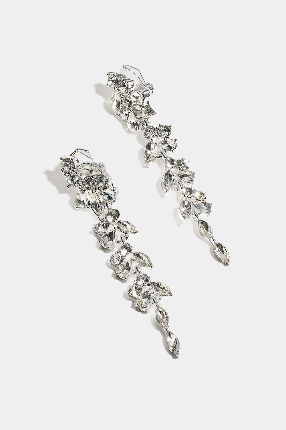 Pitkät klipsikorvakorut kirkkailla lasikivillä