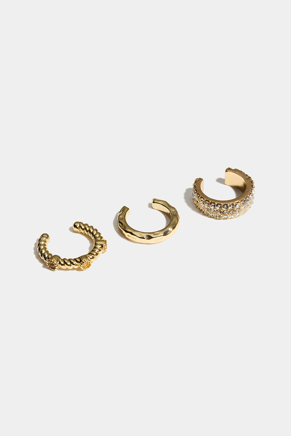 Kullanväriset ear cuff -korvakorut lasikivillä, 3 kpl