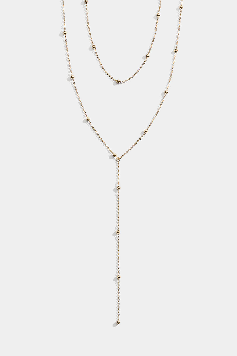 Lariat-kaulakori, jossa on pieniä palloja, kullanvärinen