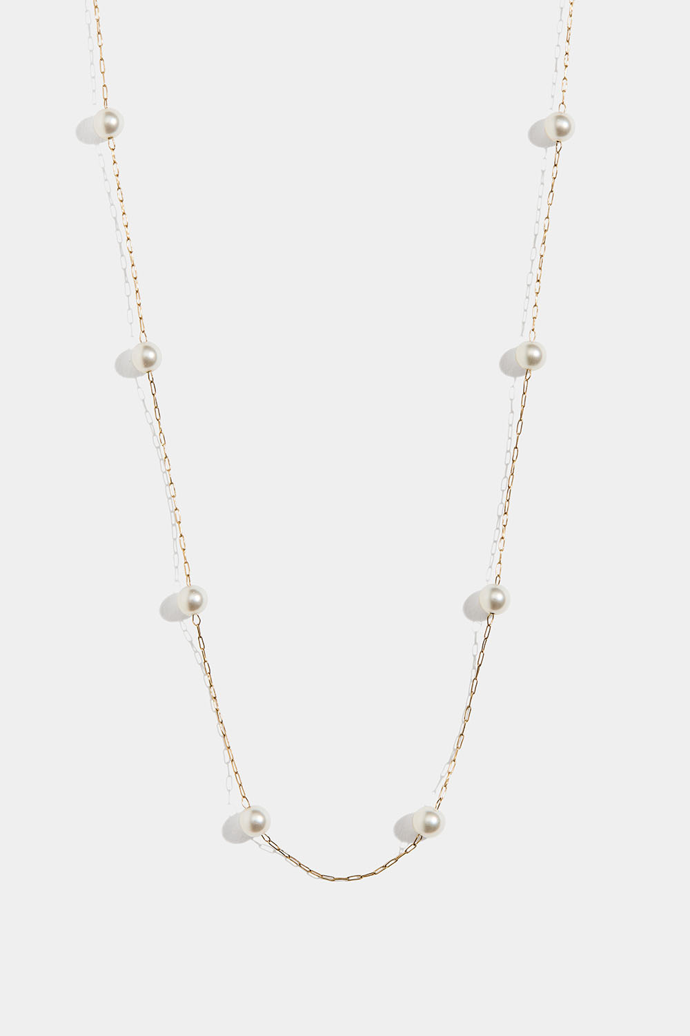 Ohut teräksinen kaulakoru, joissa 18k kultaus ja helmiä