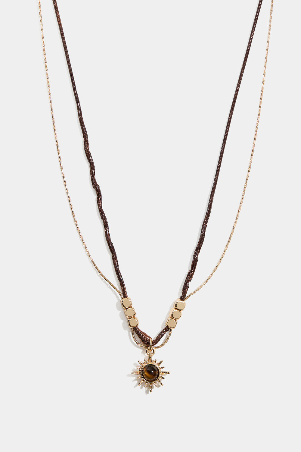 Kaulakoru auringolla ja tiikerinsilmällä