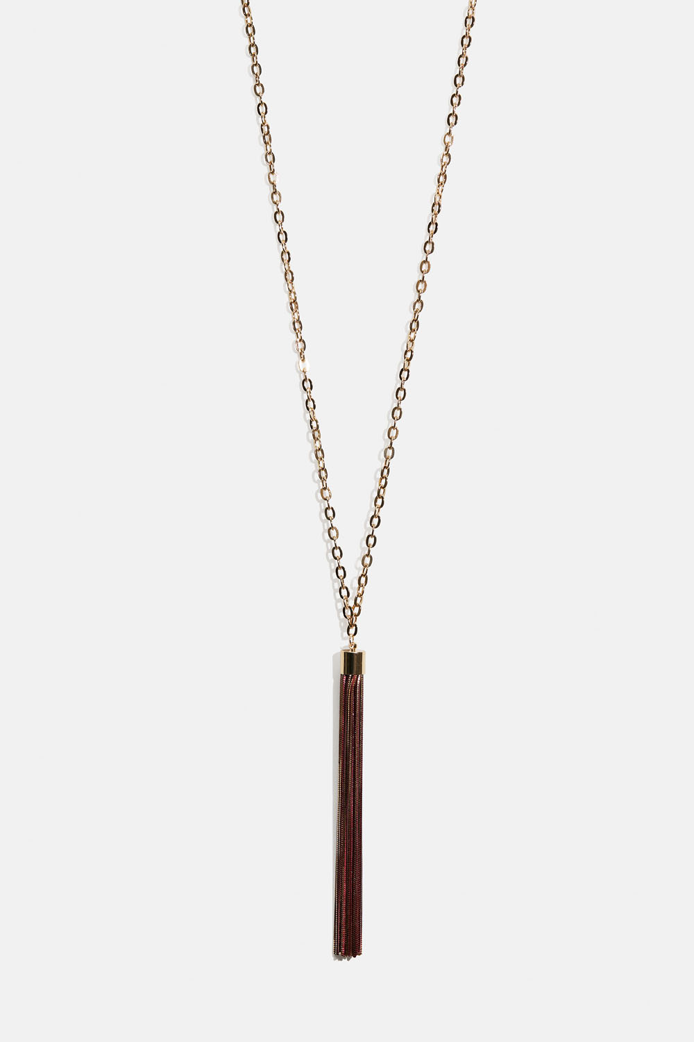 Pitkä kaulakoru, jossa punainen riipus