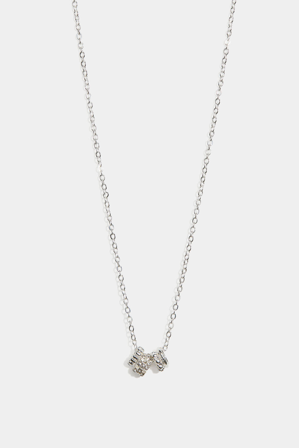 Kaulakoru, jossa neljä pyöreää riipusta