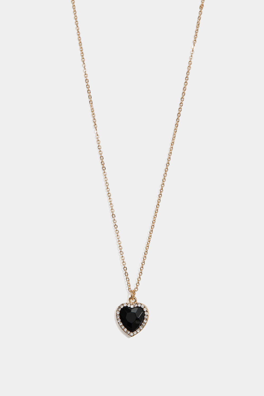 Kaulakoru, jossa musta sydämen muotoinen lasikivi