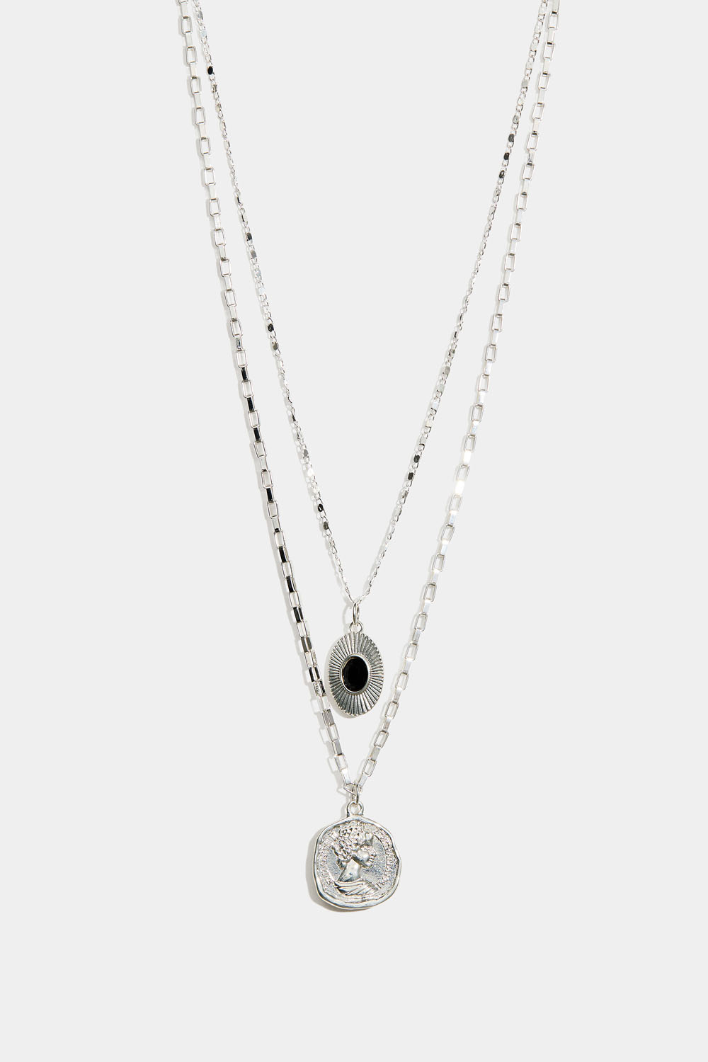 Kaksinkertainen kaulakoru, jossa kolikkoriipus