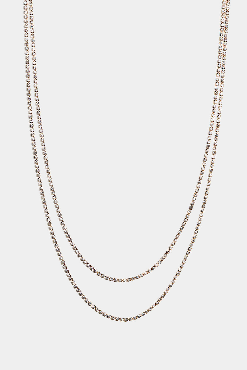 Kaksinkertainen kullanvärinen kaulakoru, jossa on strasseja