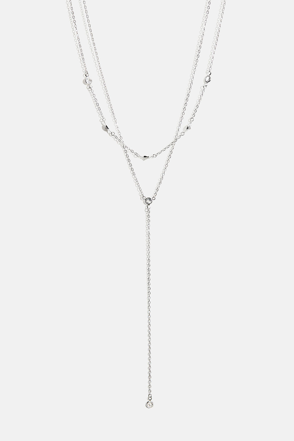 Kaksinkertainen kaulakoru, jossa pieniä pyöreitä lasikiviä