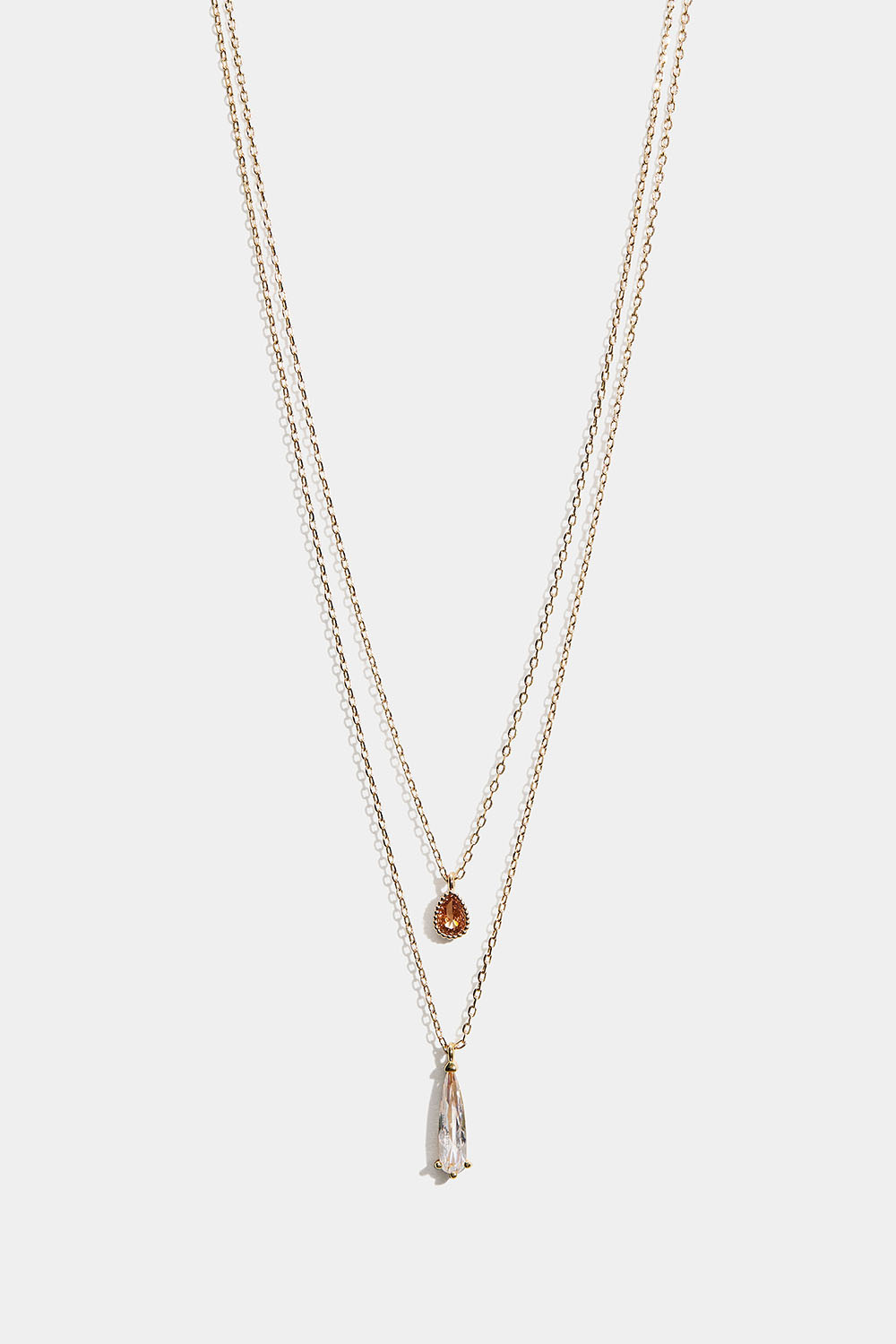 Kullanvärinen kaksinkertainen kaulakoru, jossa pisaranmuotoisia riipuksia