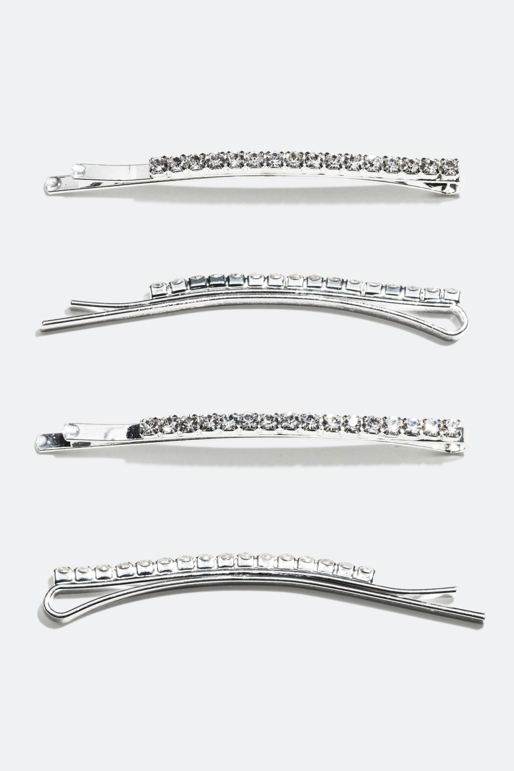 Hiuspinnit lasikiviriveillä