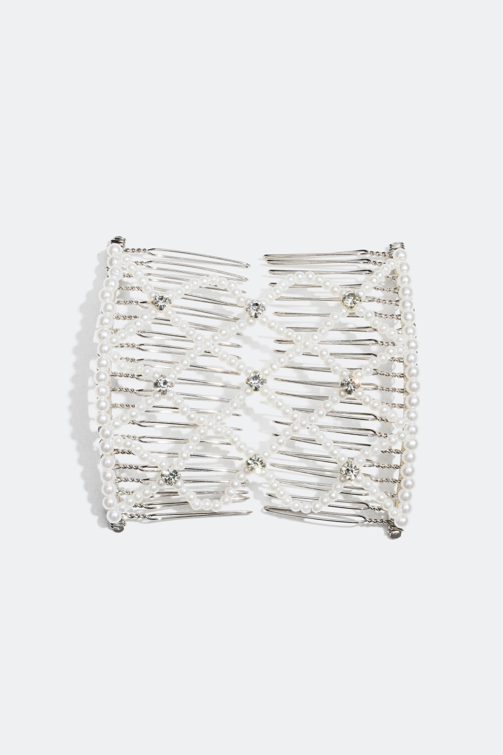 Koristekampa helmillä ja lasikivillä