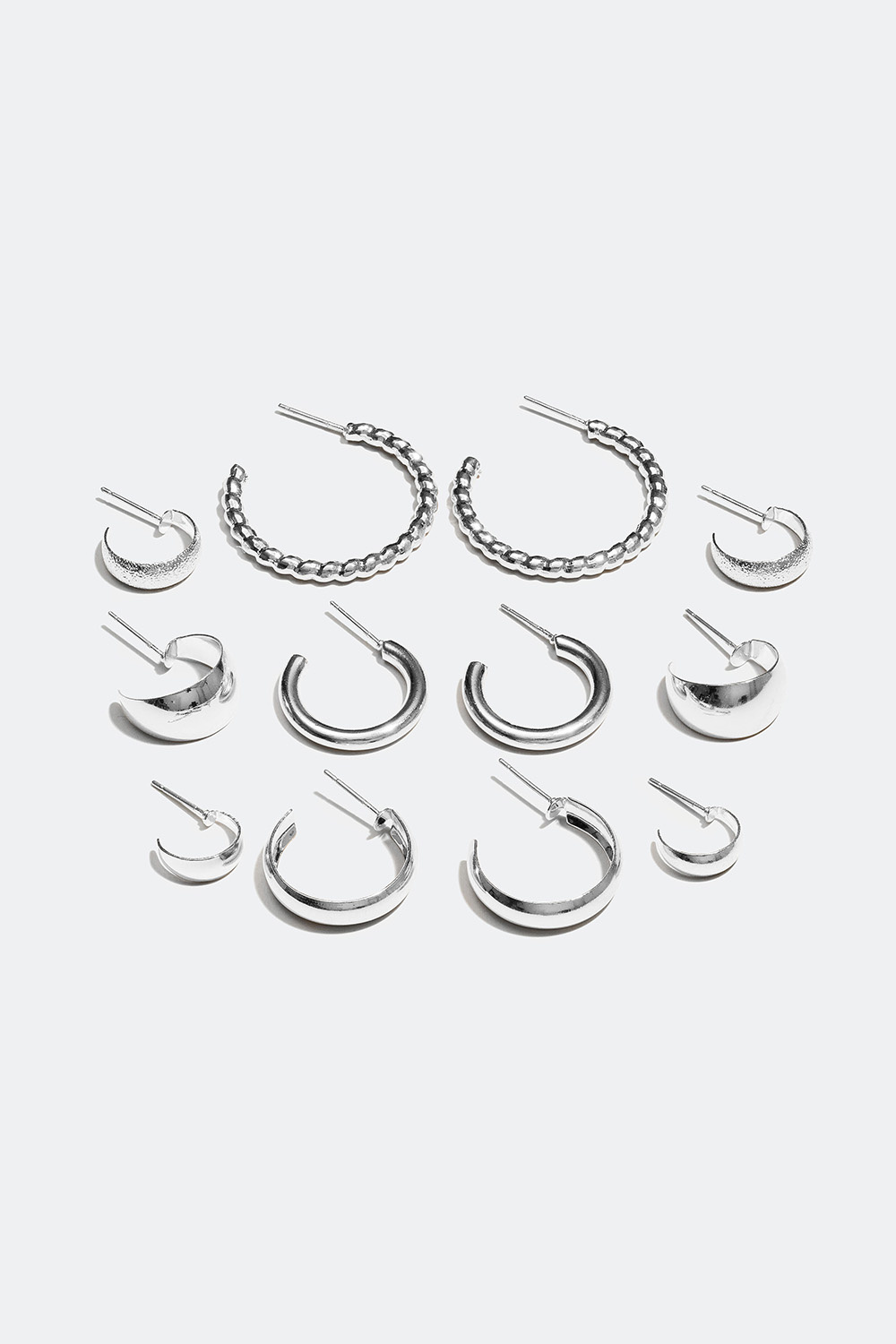 Korvarenkaat, joissa eri kokoja ja kuvioita, 6 kpl