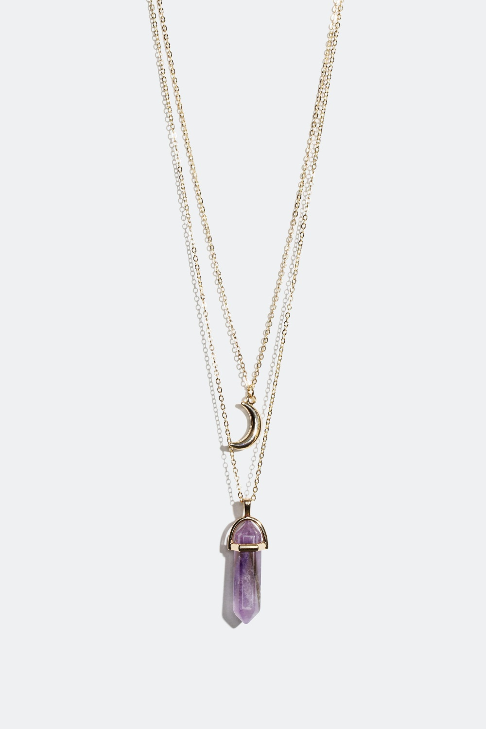 Monikerroksinen kaulakoru, kristalli ja kuu