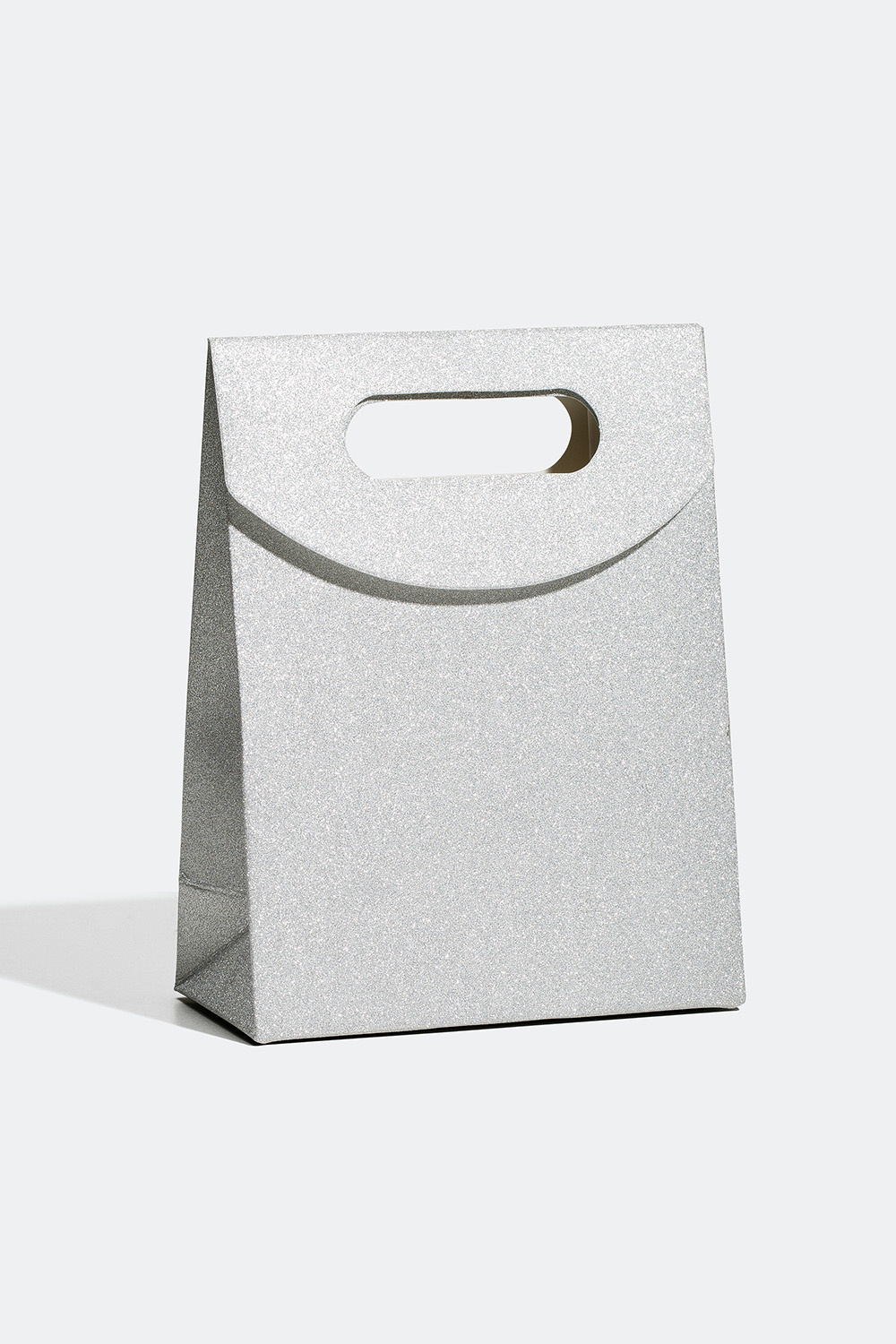 Kimaltava lahjapakkaus eri väreissä