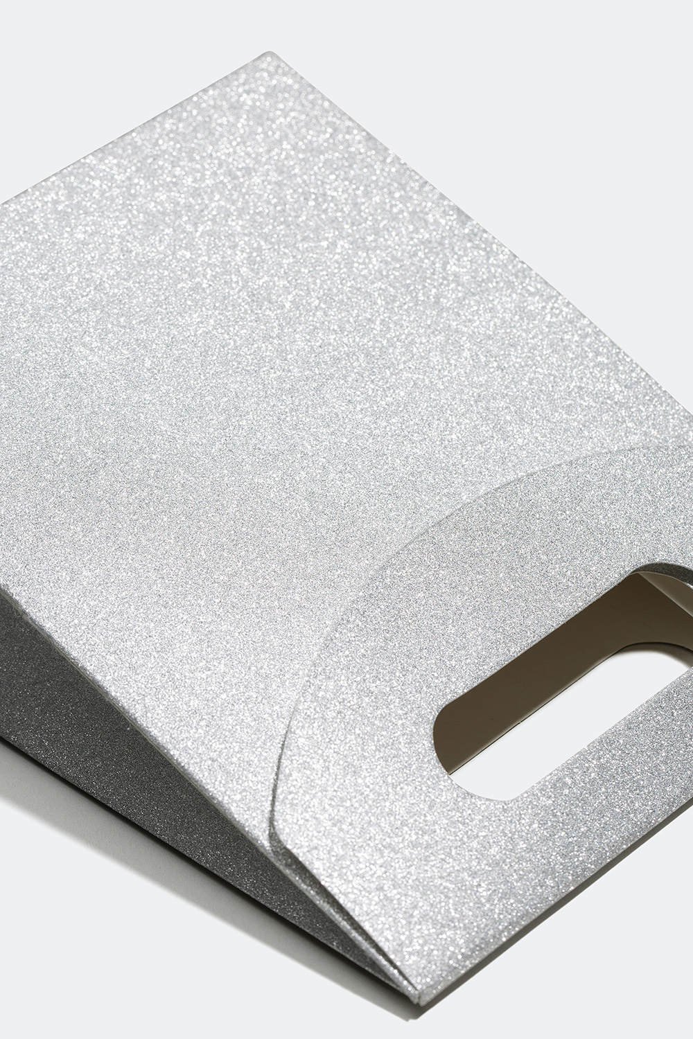 Kimaltava lahjapakkaus eri väreissä