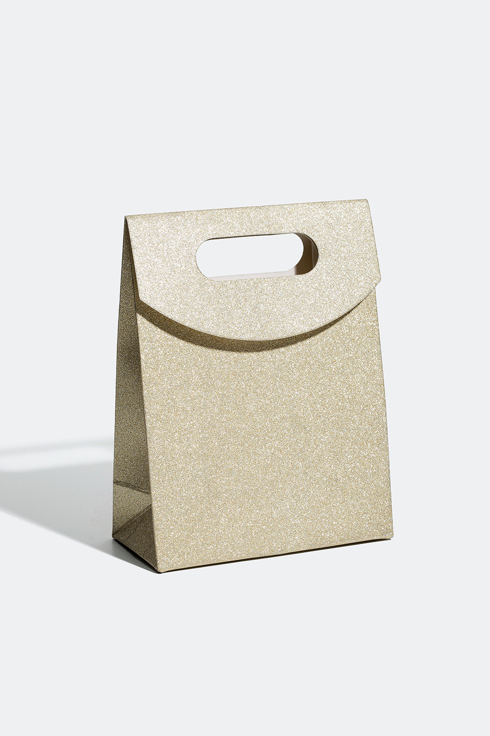 Kimaltava lahjapakkaus eri väreissä