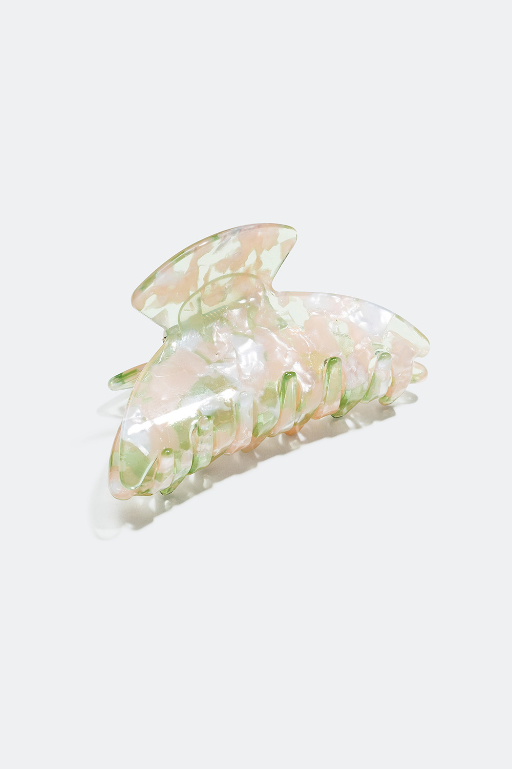 Pieni meleerattu pastellisävyinen hiussolki