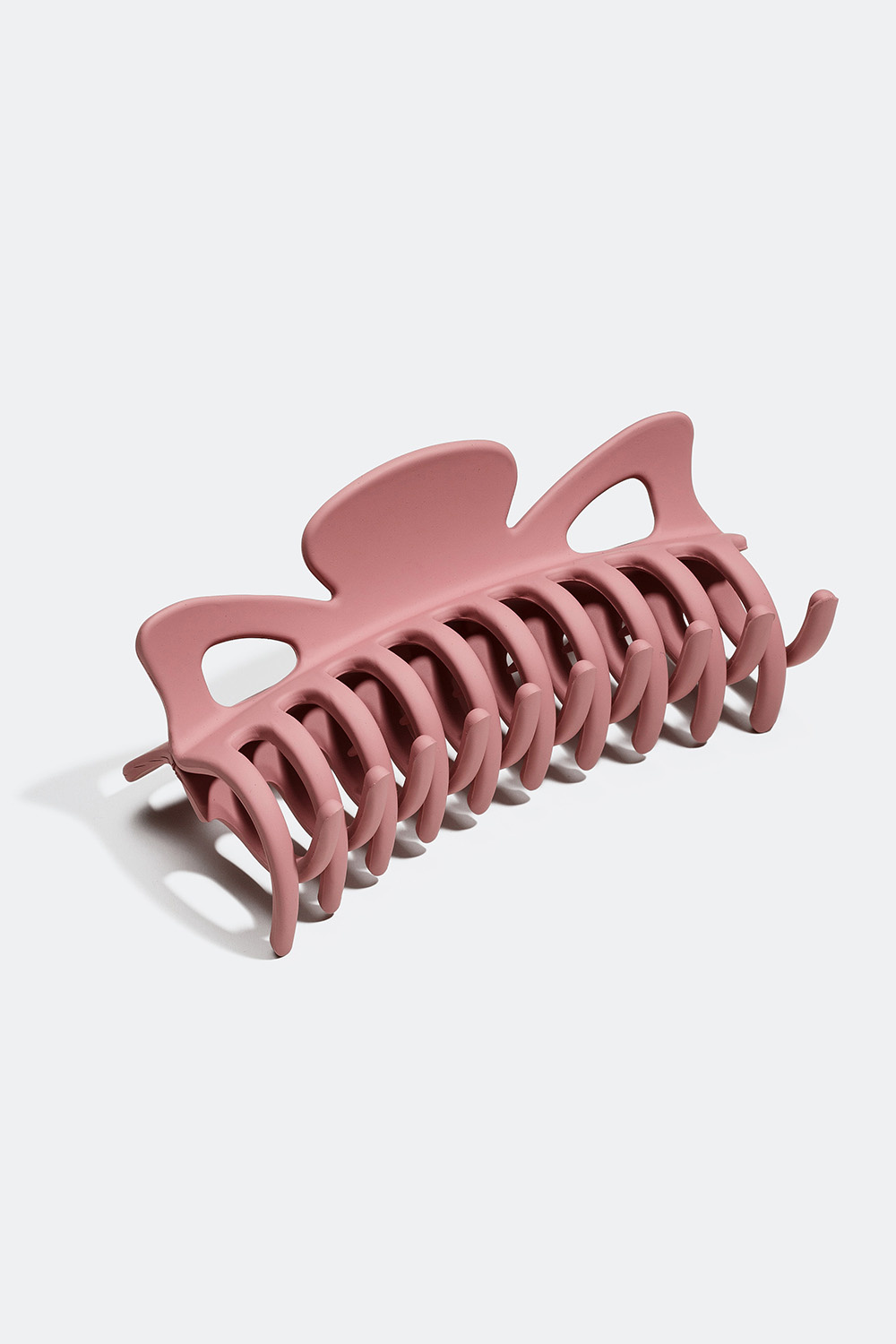 Suuri vaaleanpunainen mattapintainen hiusklipsi