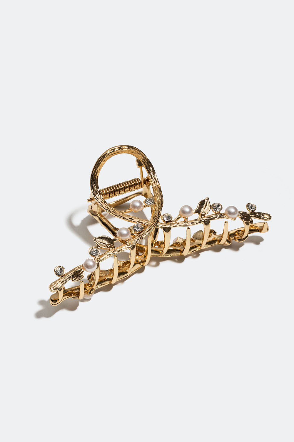 Hiussolki, jossa on lenkki ja lehtikuviointi