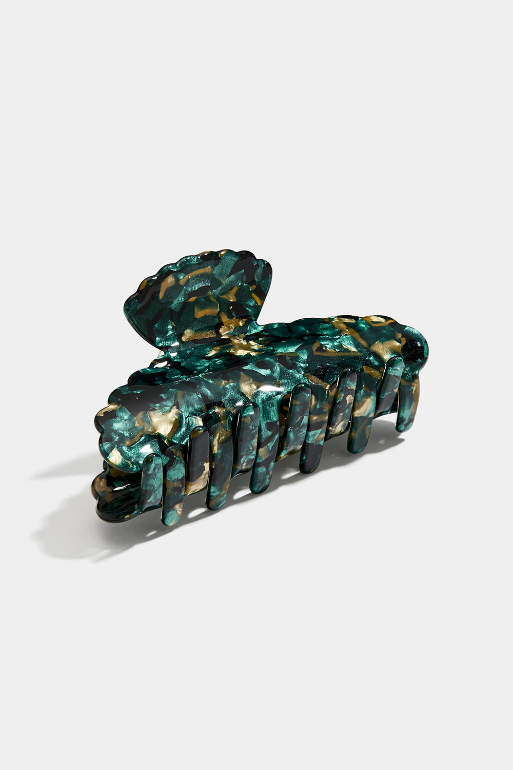 Hiusklipsi kultaisella ja vihreällä marmoroinnilla
