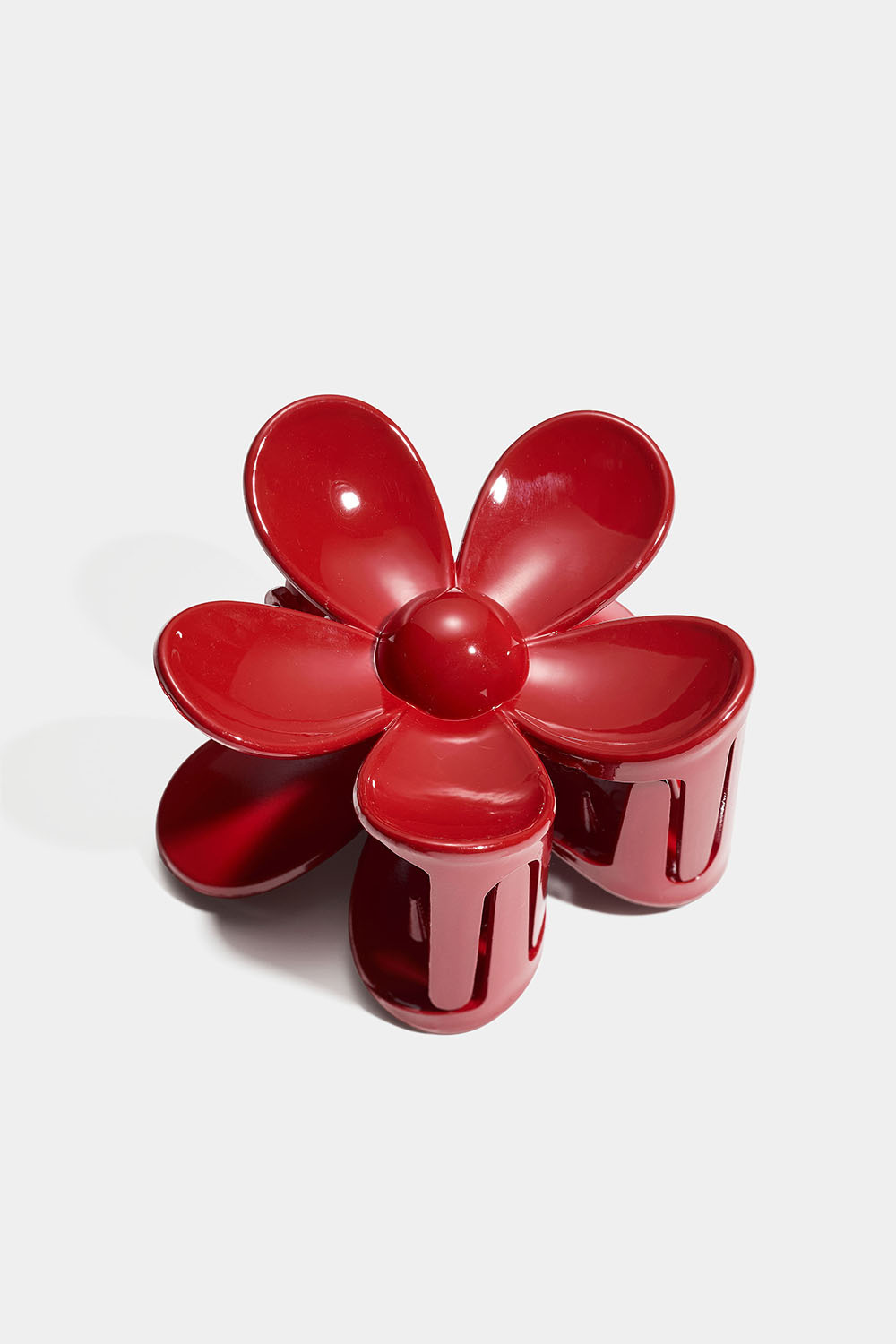 Punainen kukanmuotoinen hiusklipsi