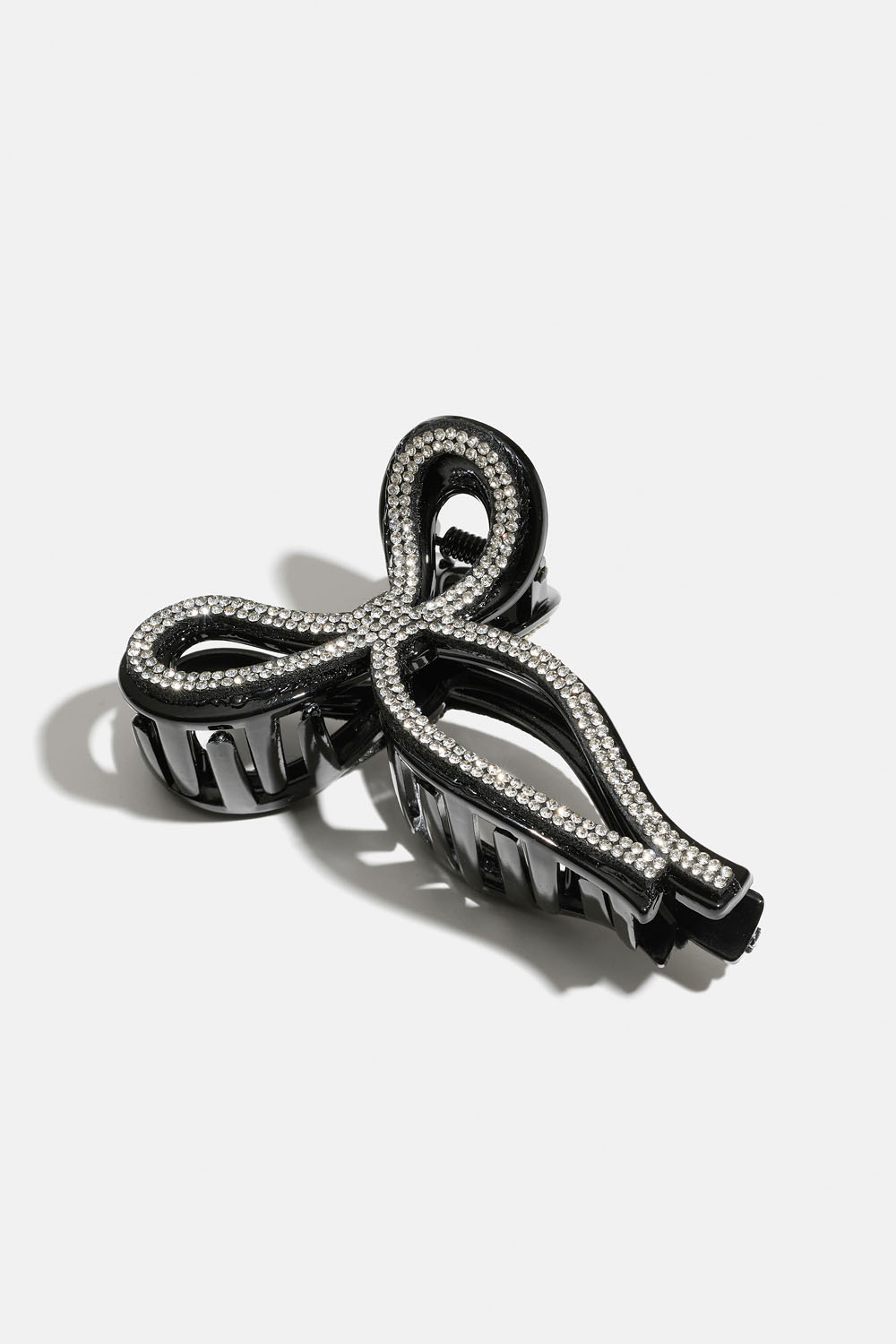 Rusetinmuotoinen hiusklipsi strasseilla