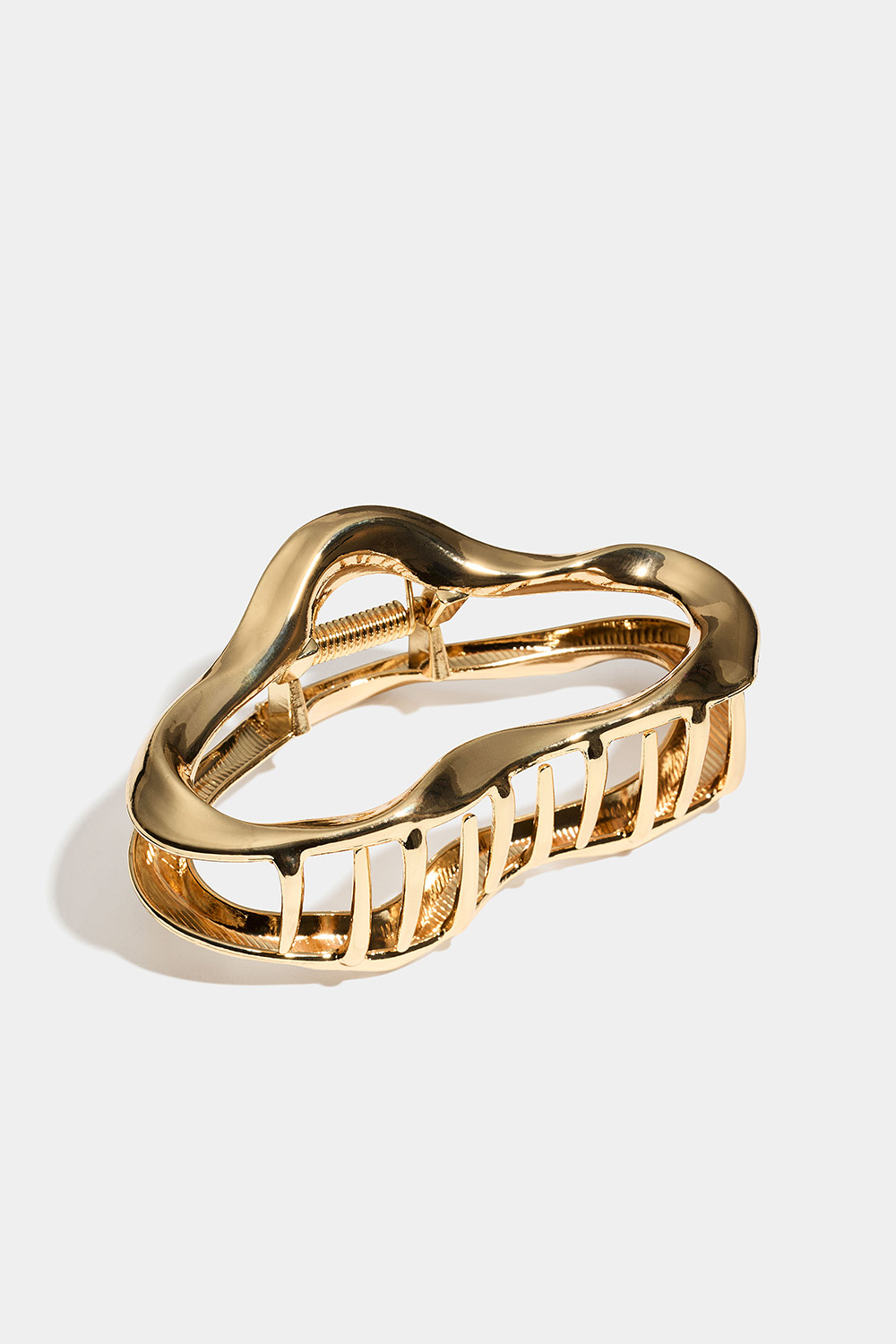 Kullanvärinen, orgaanisen muotoinen hiussolki