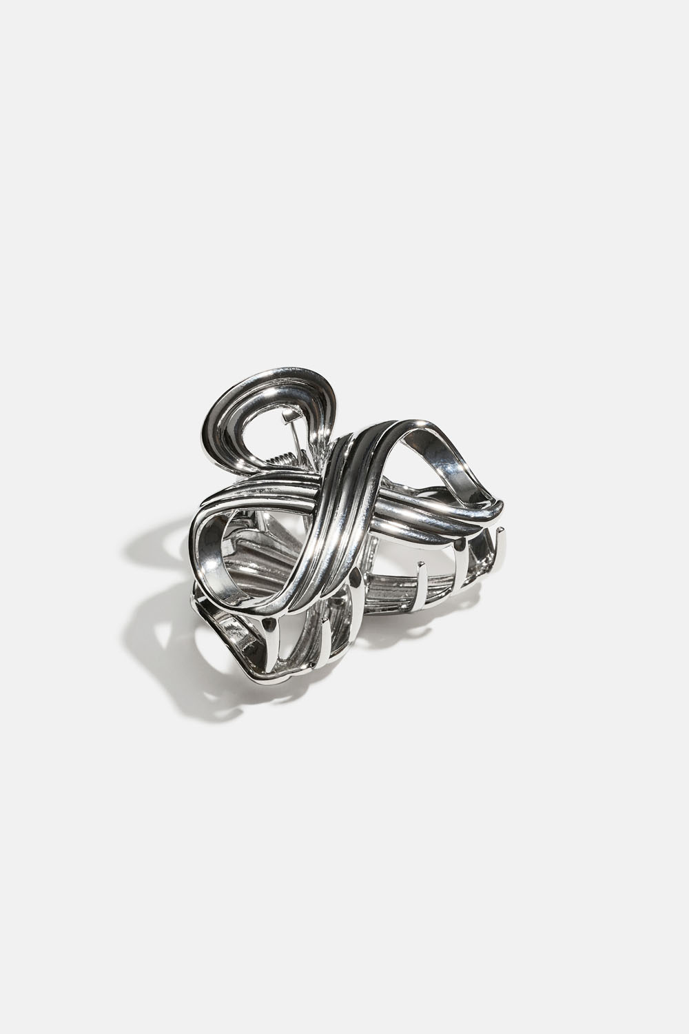 Metallinen hiusklipsi, jossa pyöreät muodot