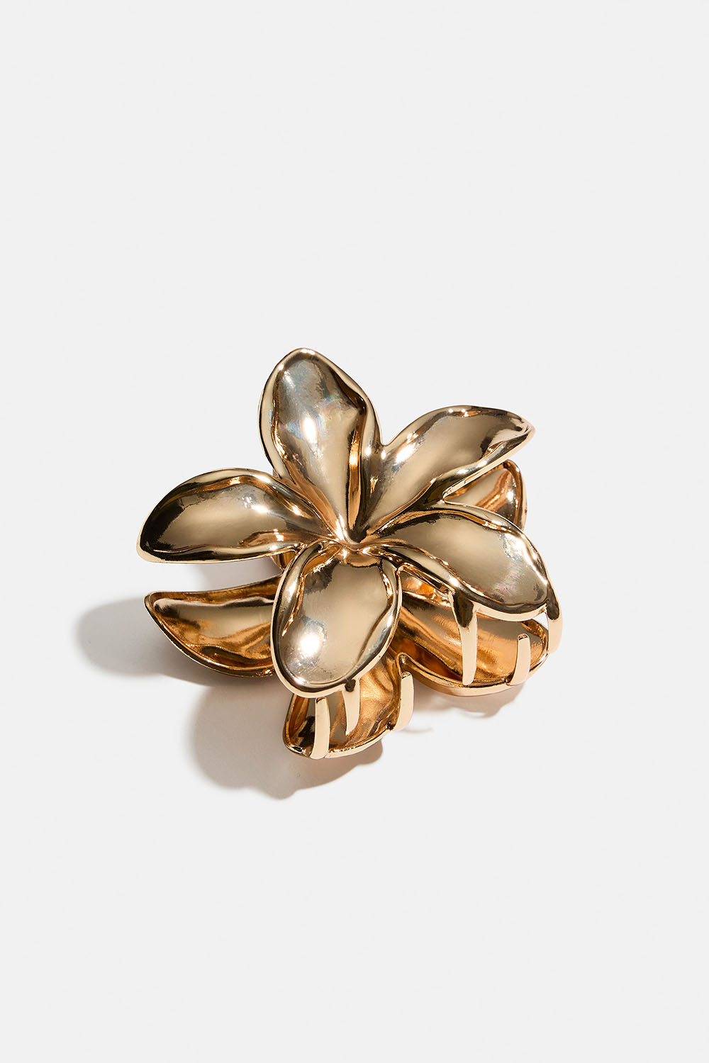 Kukan muotoinen kullanvärinen metallihiusklipsi