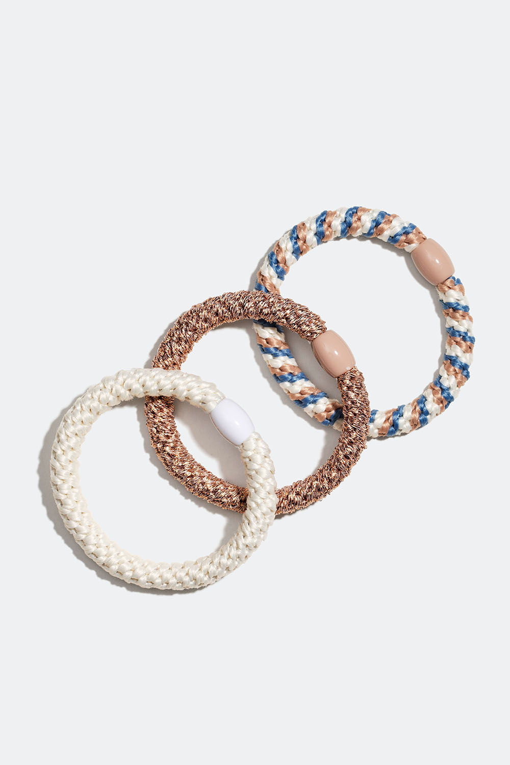 Sekoitus valkoisia, beigejä ja sinisiä punottuja hiuslenkkejä, 3 kpl