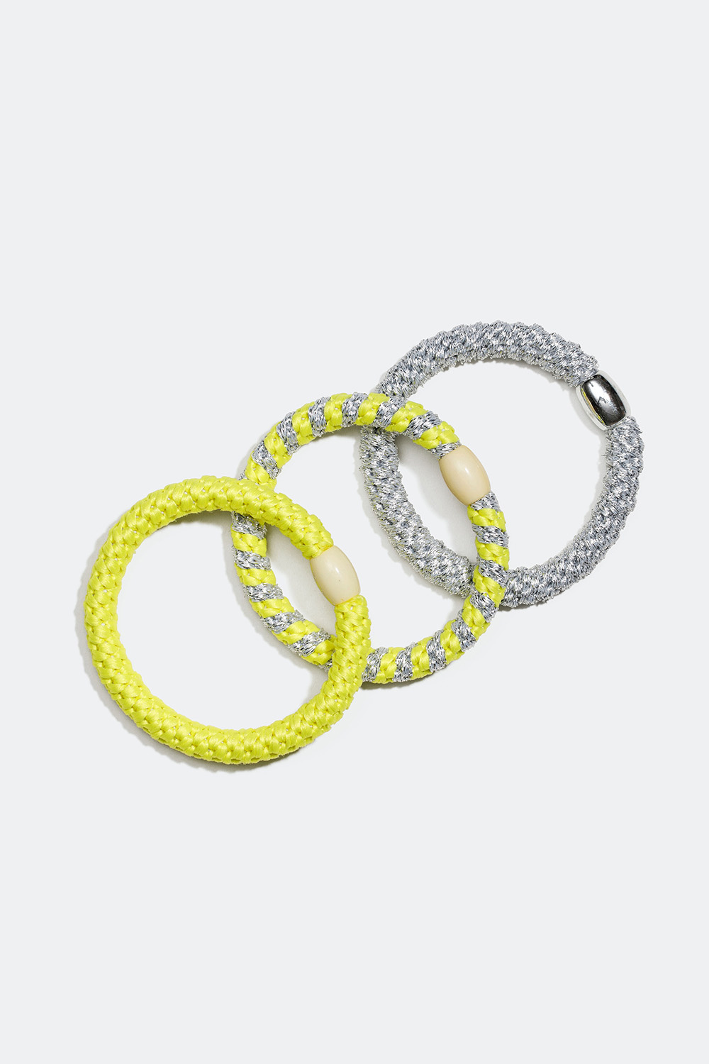 Punotut hiuslenkit hopean ja neonkeltaisen värisinä, 3 kpl