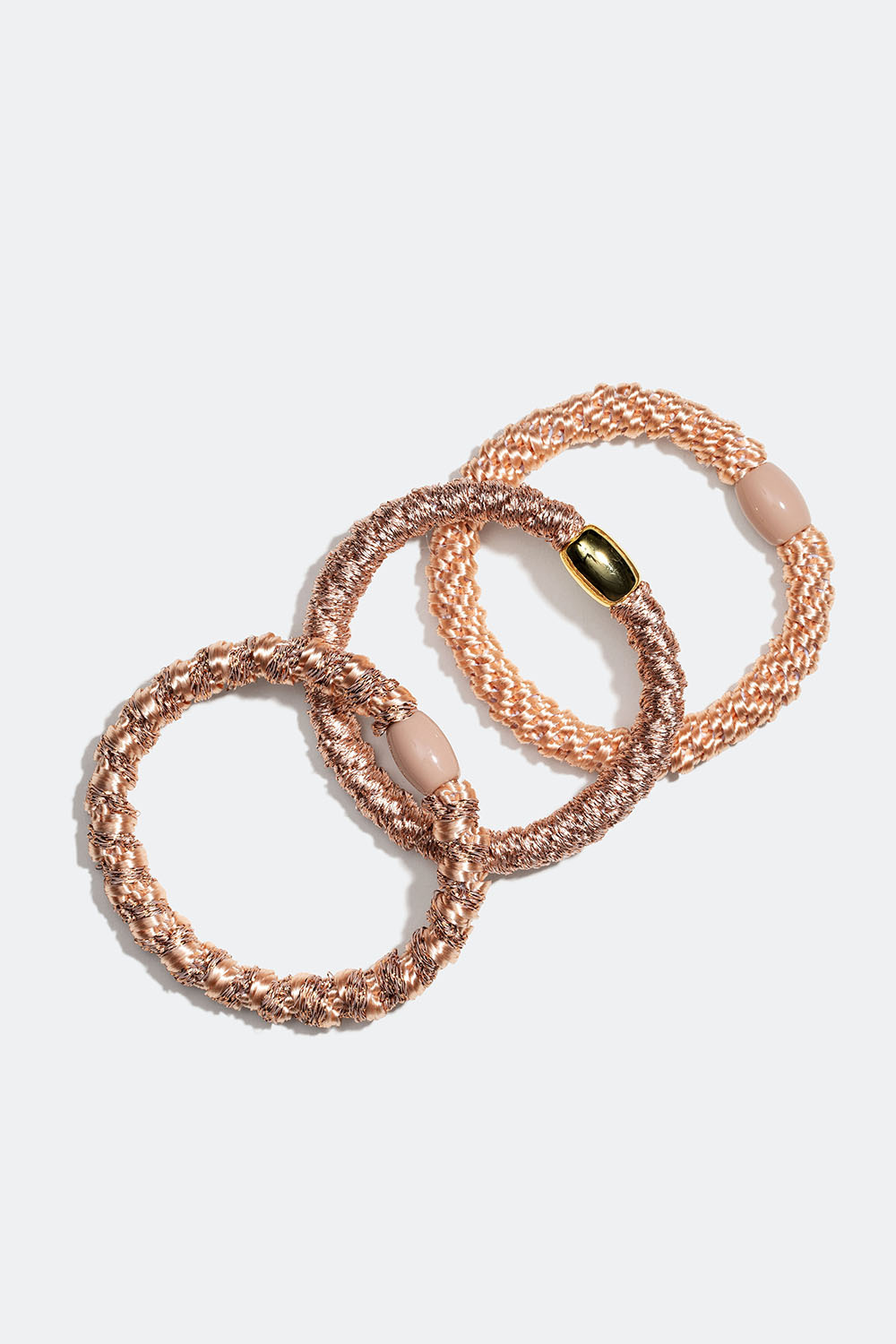 Sekoitus kimaltavan vaaleanpunaisia punottuja hiuslenkkejä, 3 kpl