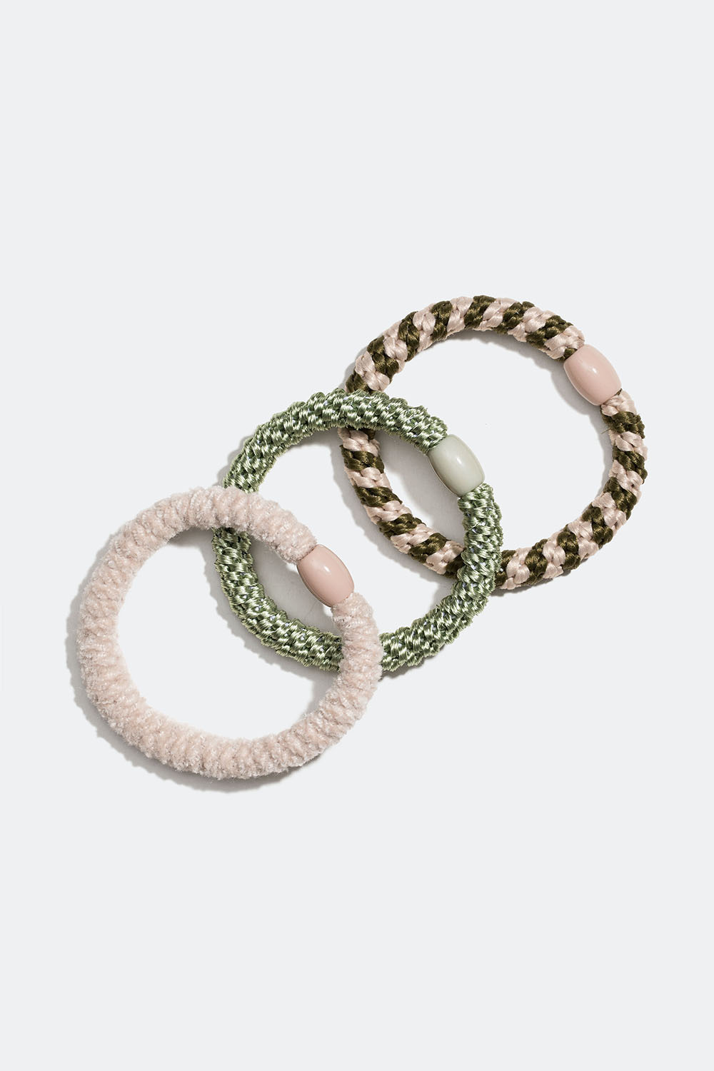 Sekoitus vihreitä ja valkoisia punottuja hiuslenkkejä, 3 kpl