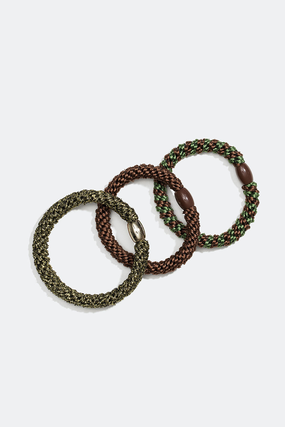 Sekoitus ruskeita ja vihreitä punottuja hiuslenkkejä, 3 kpl