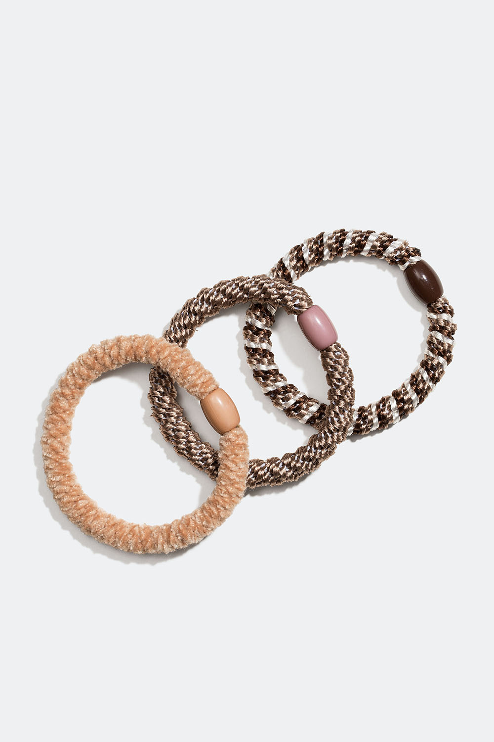 Sekoitus beigejä ja ruskeita punottuja hiuslenkkejä, 3 kpl