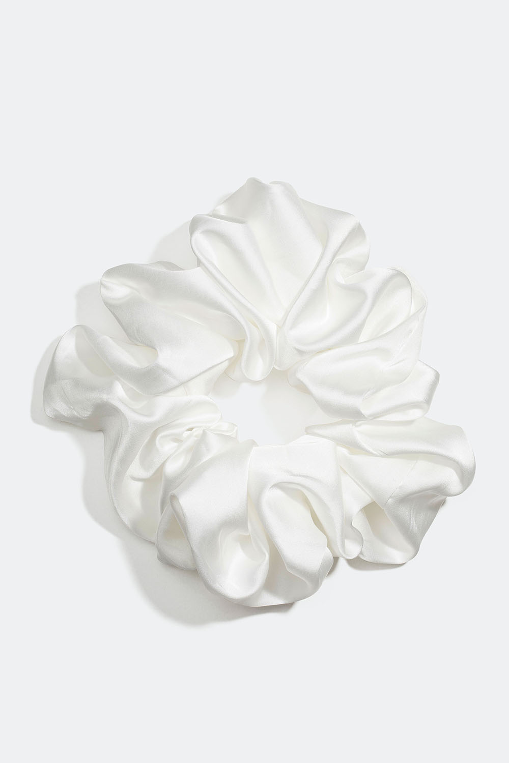 Iso valkoinen hiusdonitsi