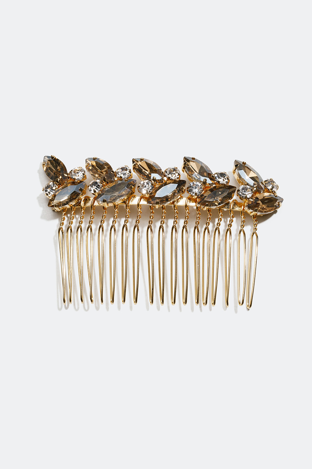 Kullanvärinen hiuskampa, jossa lasikiviä