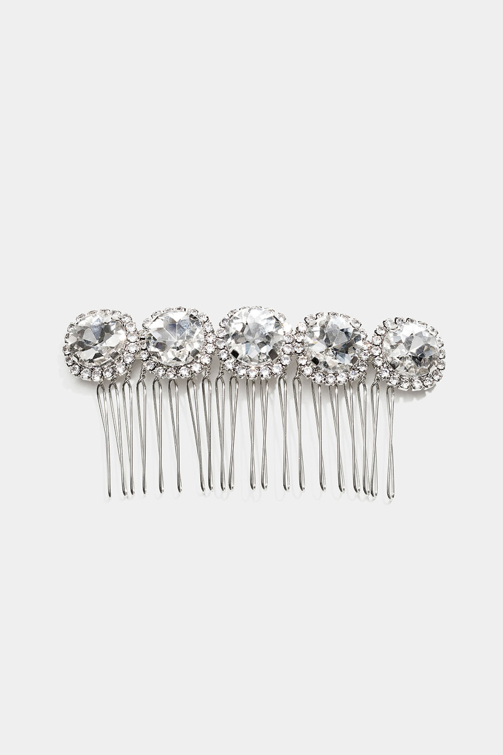 Hiuskampa, jossa isoja lasikiviä ja strasseja