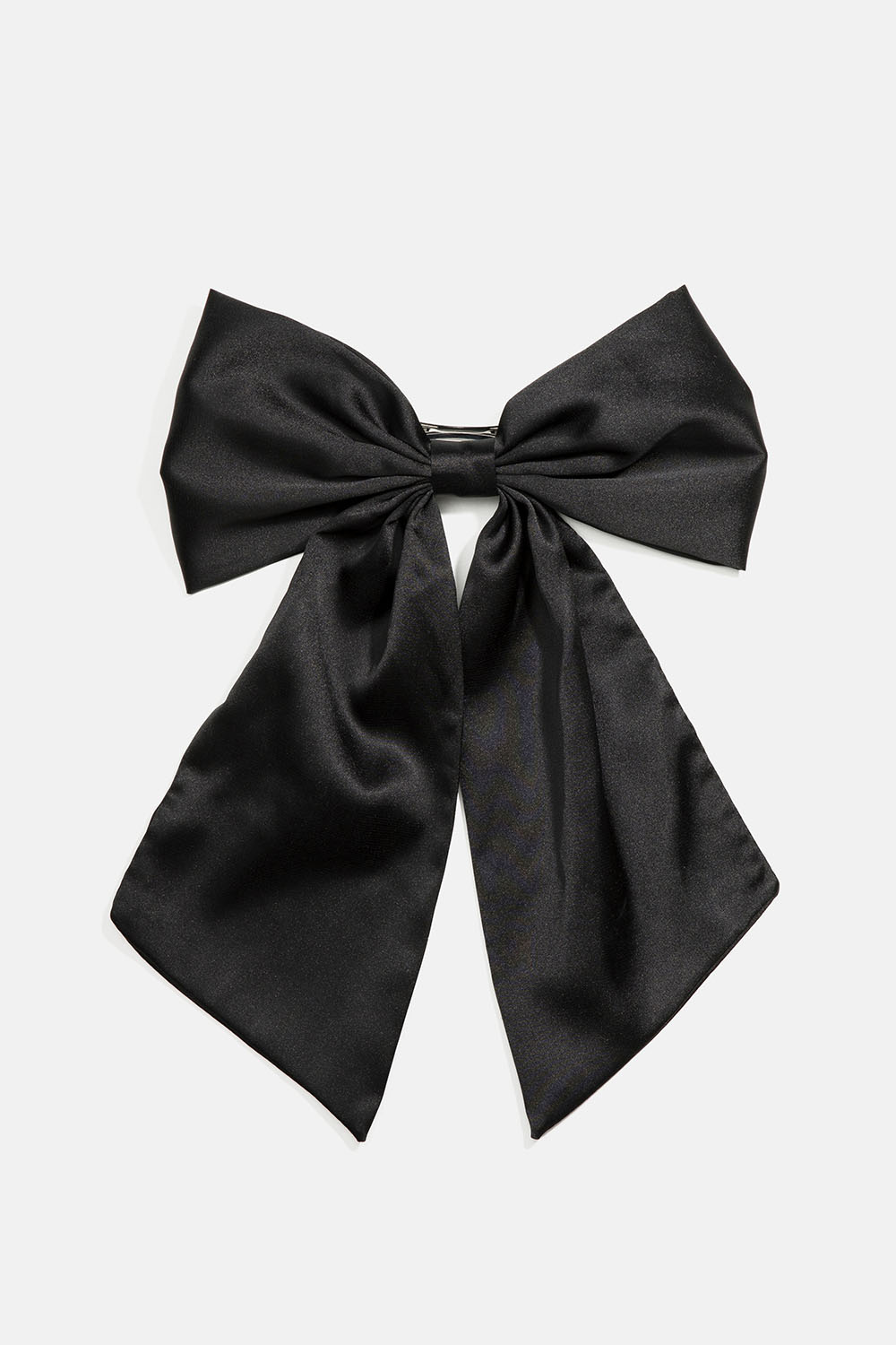 Hiussolki, jossa iso musta rusetti