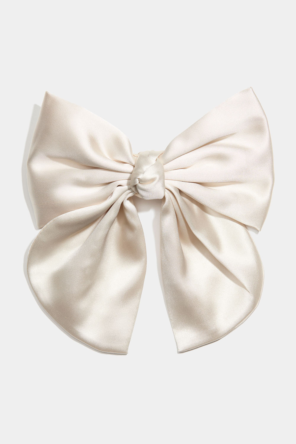 Hiussolki, jossa beige rusetti ja solmu