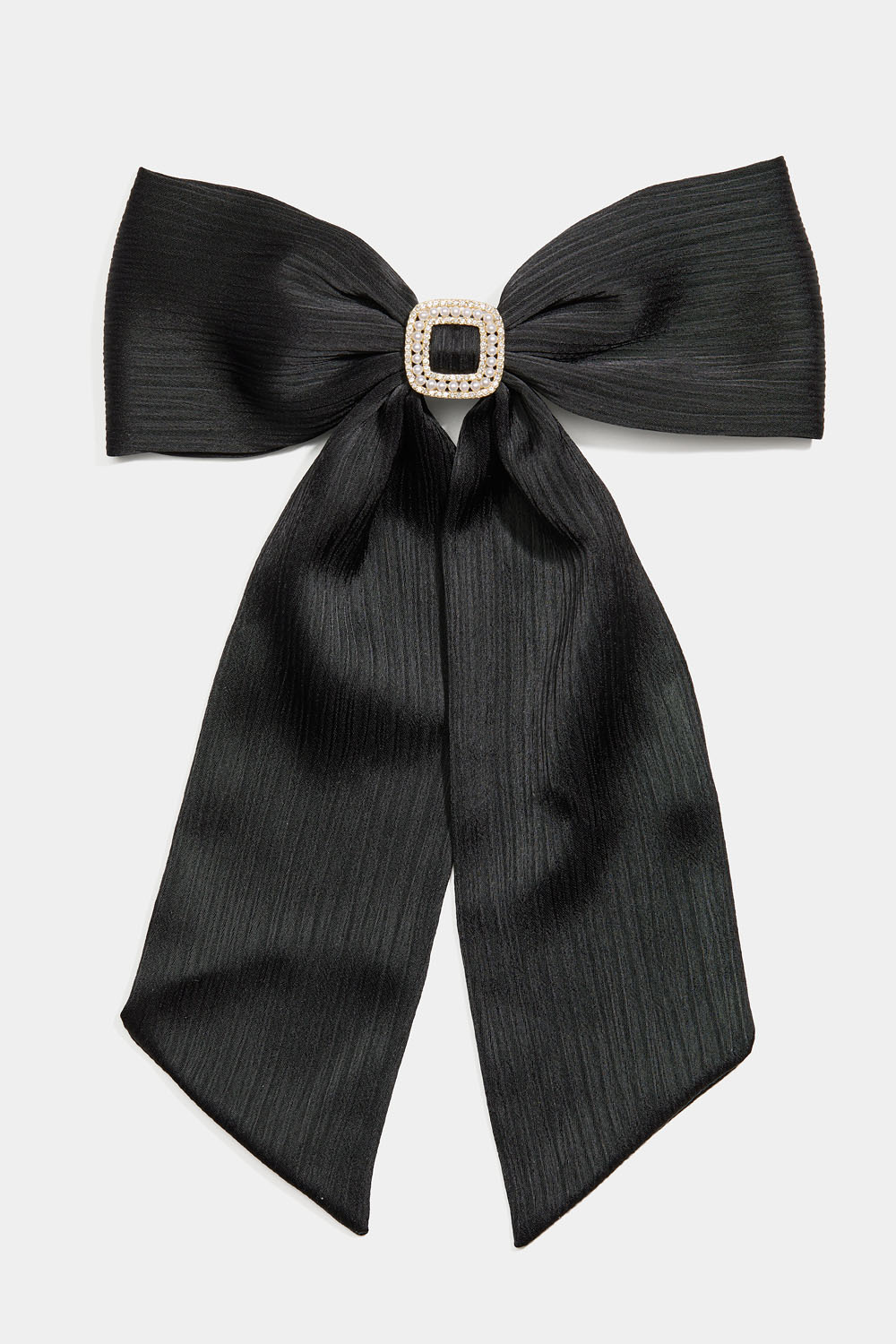 Hiussolki, jossa musta rusetti ja strasseja