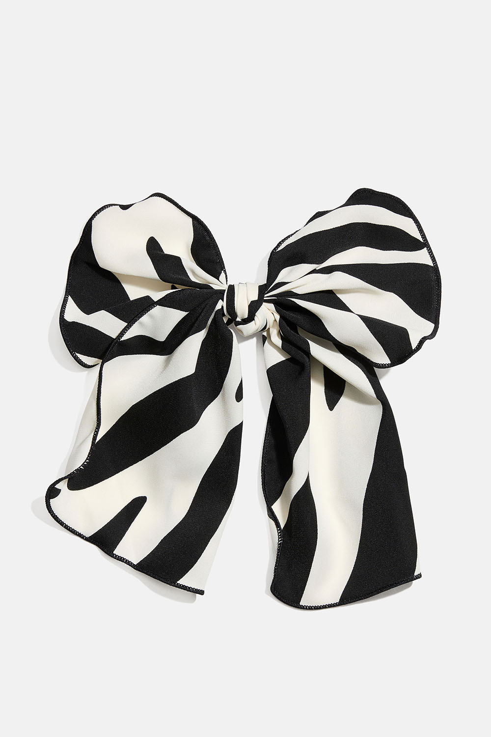 Hiussolki, jossa rusetti seeprakuvioisesta kankaasta