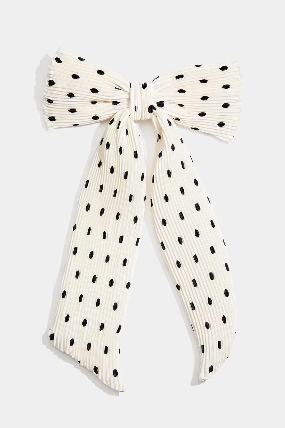 Hiussolki, jossa pliseerattu, pilkullinen valkoinen rusetti