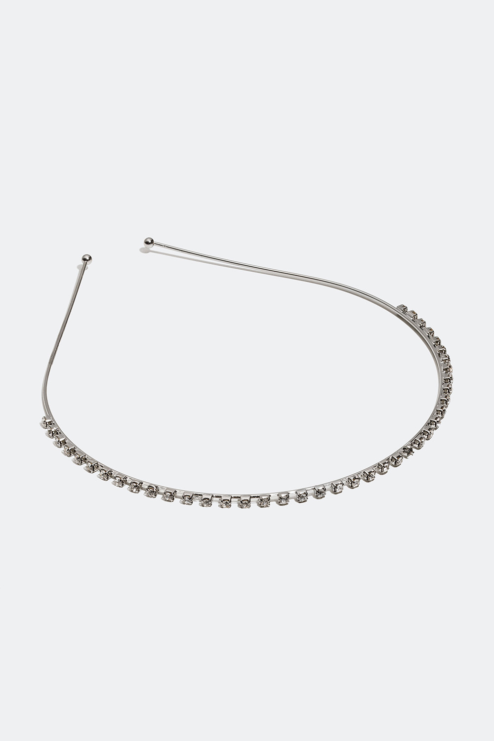 Hopeanvärinen hiuspanta, jossa on lasikiviä