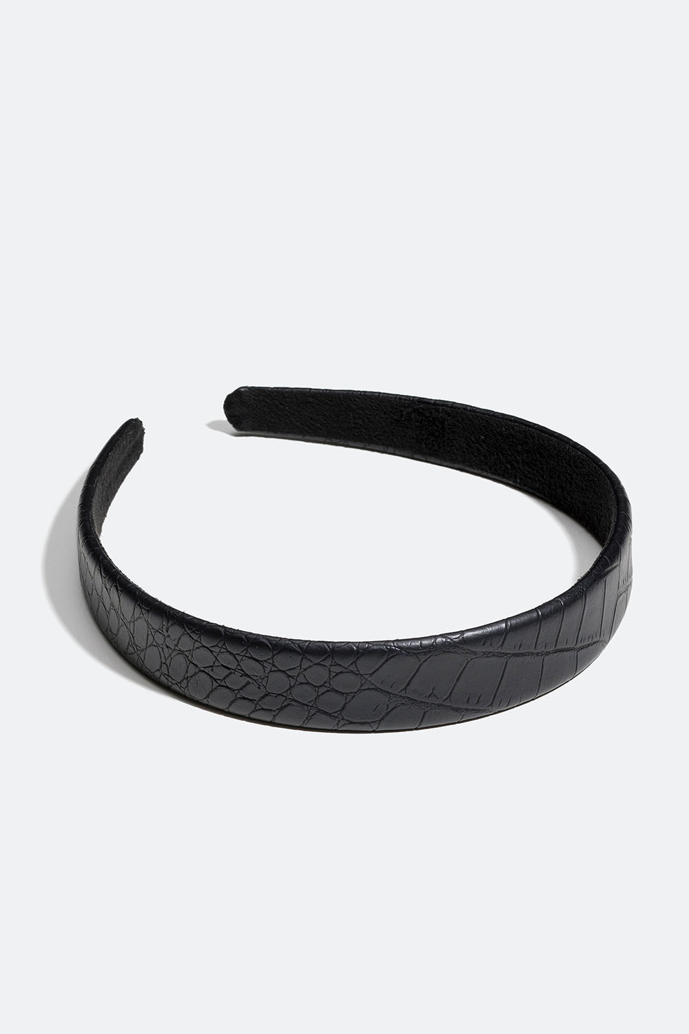 Musta krokotiilikuvioinen hiuspanta