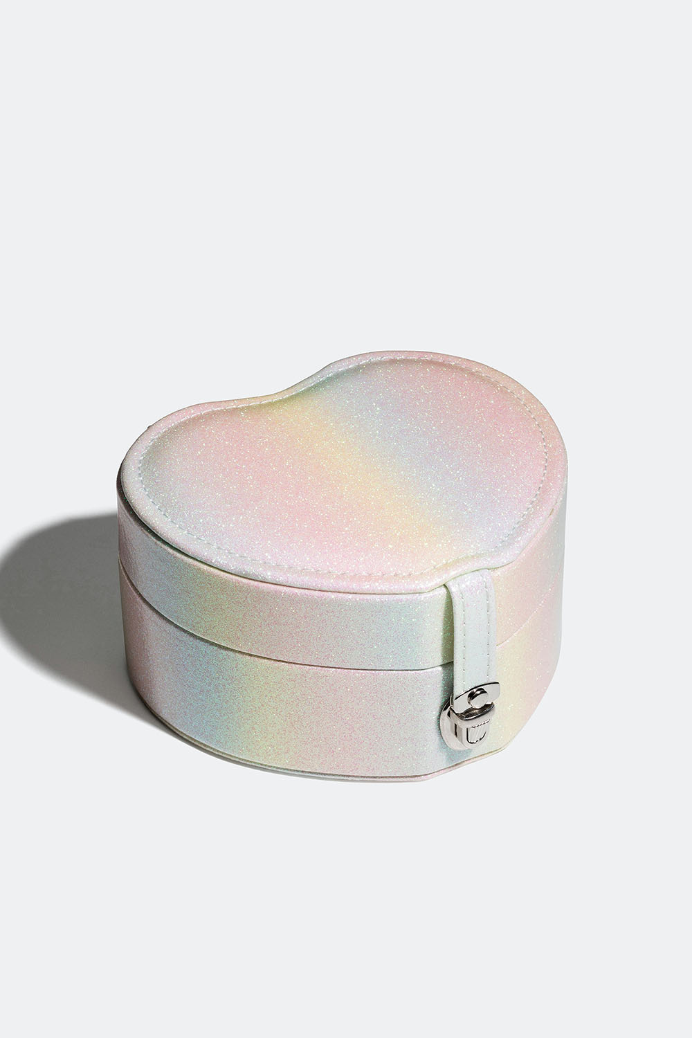 Sydämenmuotoinen ja sateenkaaren värinen korurasia