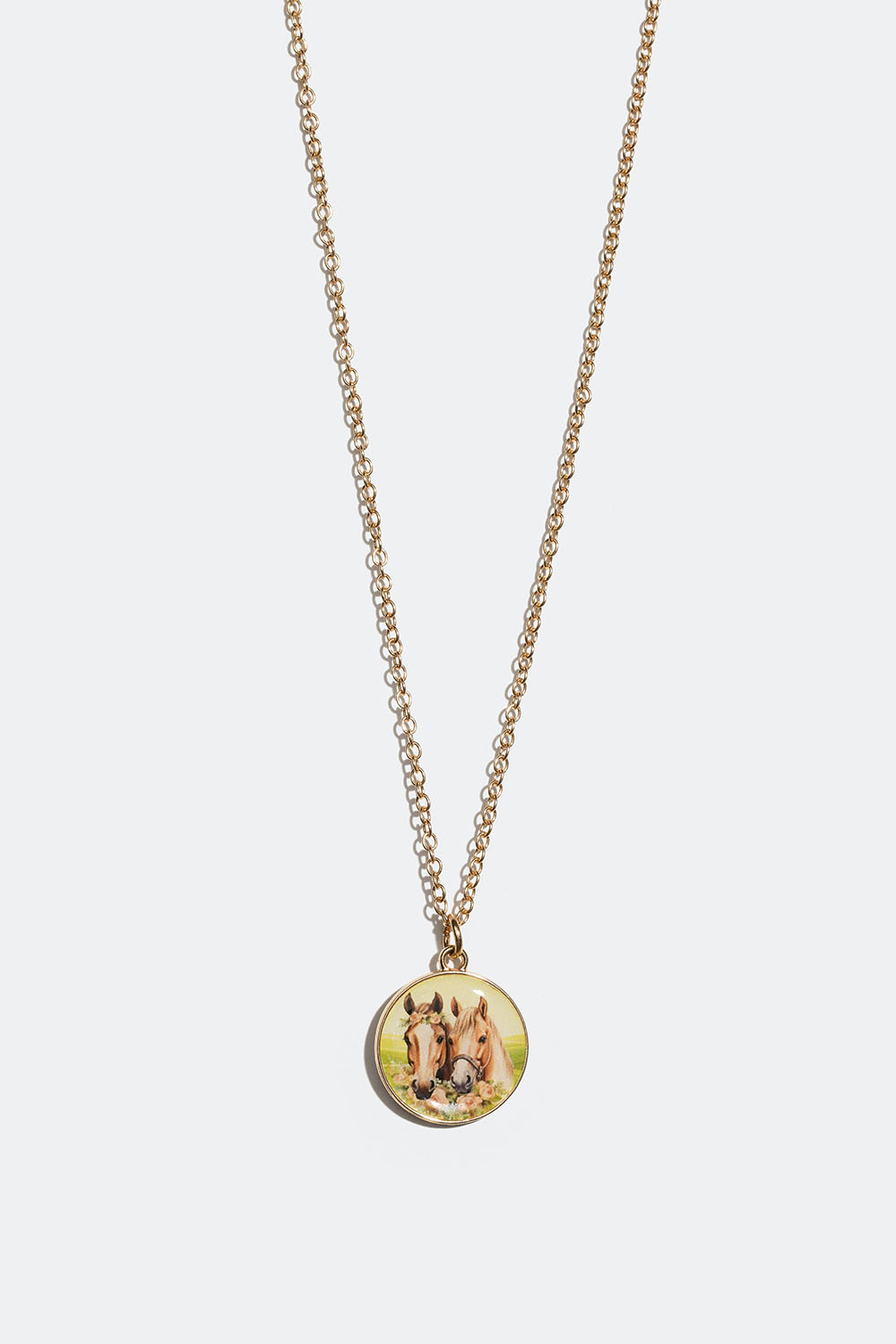 Kaulakoru, jossa hevosella koristettu pyöreä riipus