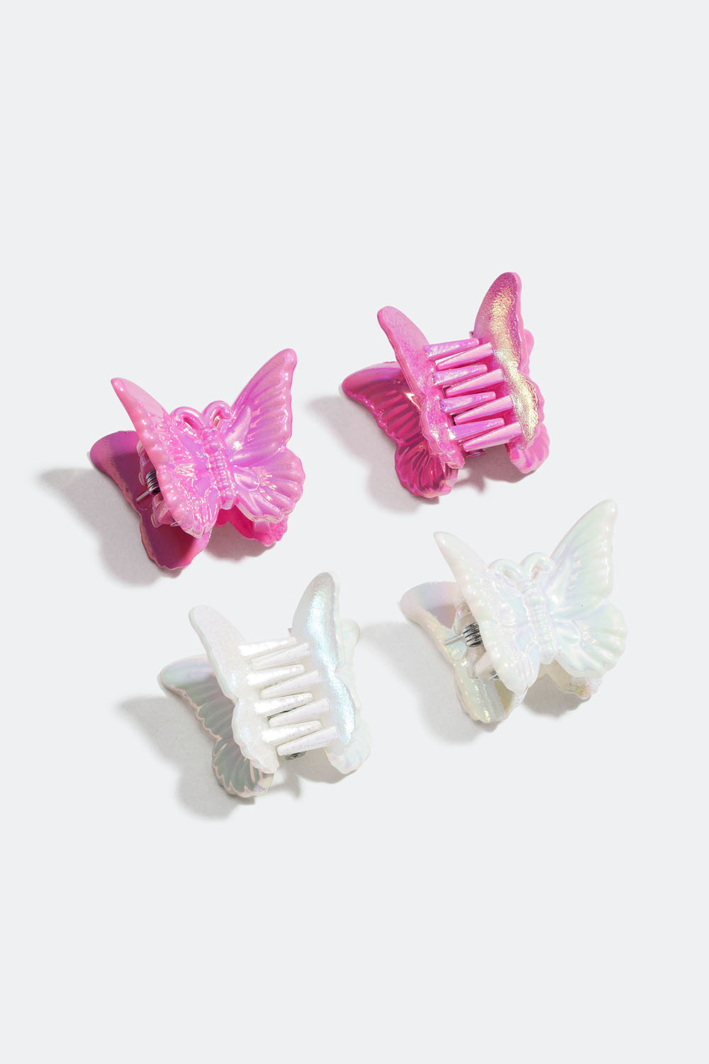 Pienet, valkoiset ja pinkit hiusklipsit, joissa perhosia, 4 kpl