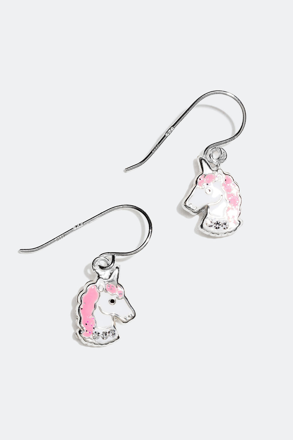 Korvakorut aitoa hopeaa yksisarviskoristeella