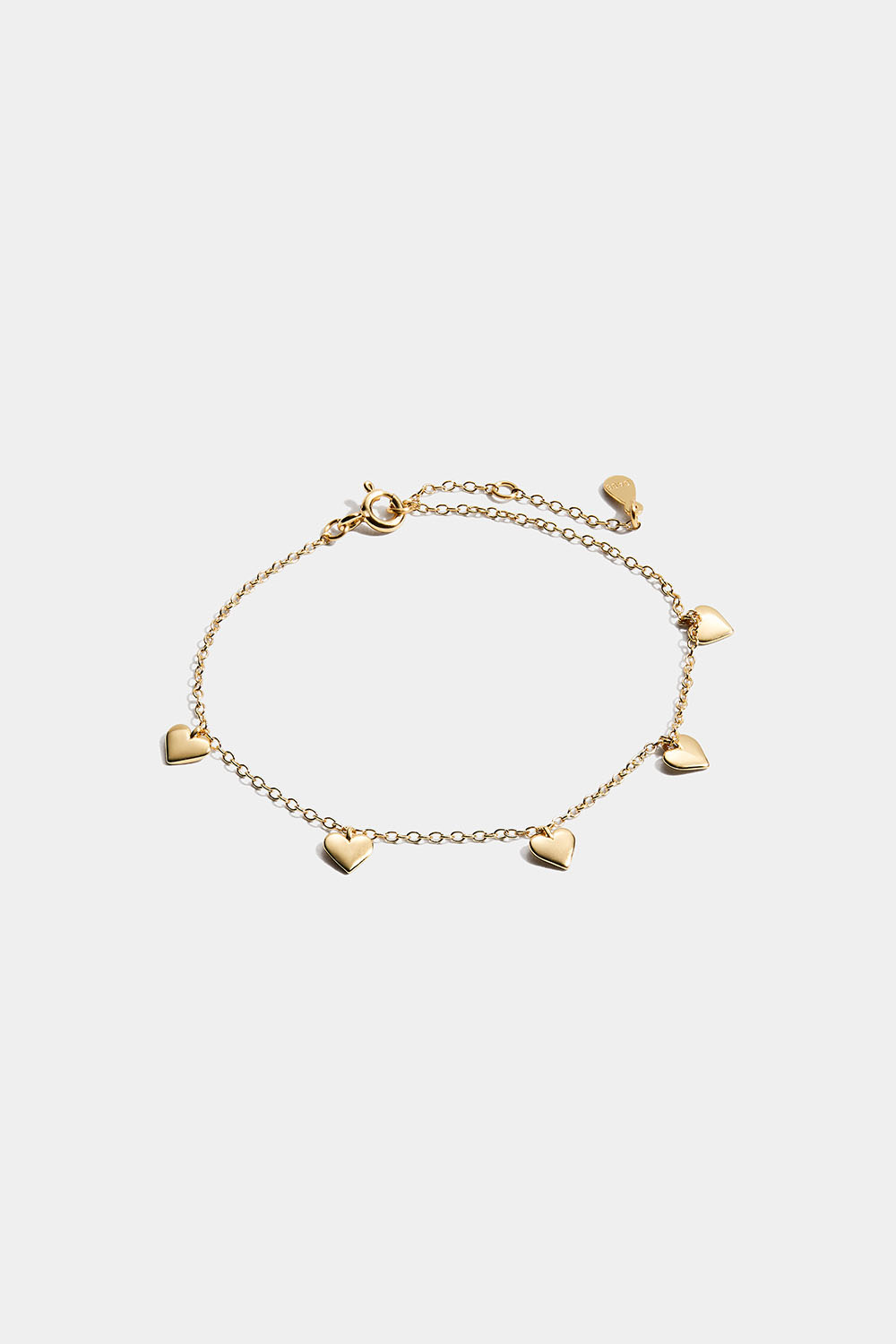 18k kullattu rannekoru, jossa riippuvia sydämiä